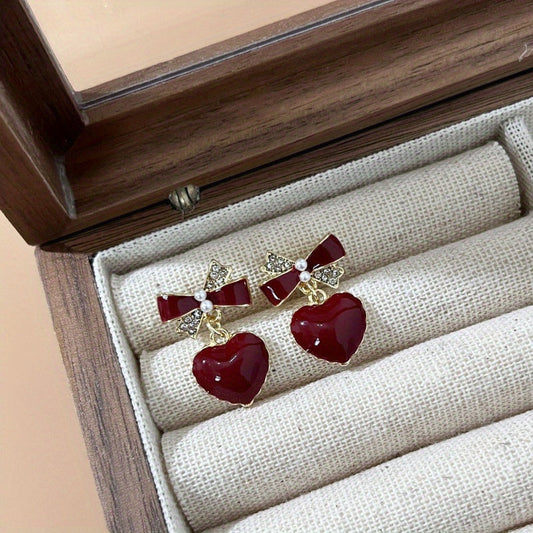 NAIM | Aretes en forma de corazón elegantes